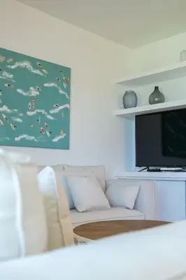 Una televisión o centro de entretenimiento en Vivienda Vacacional Pasito Blanco 1