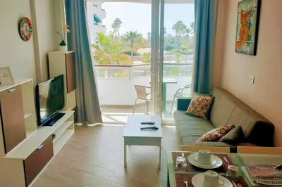 Una televisión o centro de entretenimiento en La Palmera 311 by CASAS COCODRILO