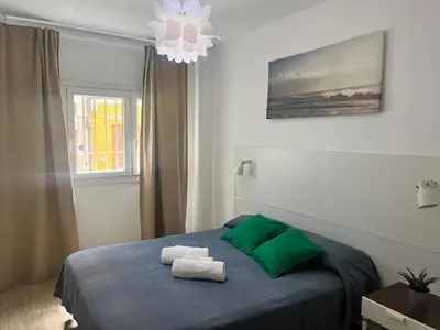 Cama o camas de una habitación en Green Beach Las Canteras