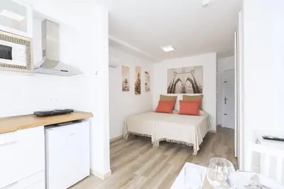 Cama o camas de una habitación en K2 PLAYA DEL INGLES by Homestaygrancanaria
