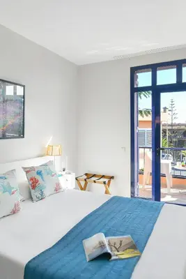 Cama o camas de una habitación en Meloneras Bahia 28 by VillaGranCanaria