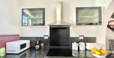Una cocina o zona de cocina en Sunlight Place Bungalow