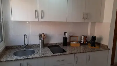 Una cocina o zona de cocina en La Fortaleza House MOGAN