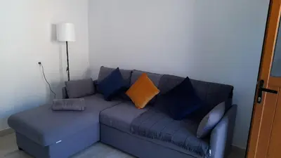 Zona de estar de La Fortaleza House MOGAN