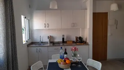 Una cocina o zona de cocina en La Fortaleza House MOGAN