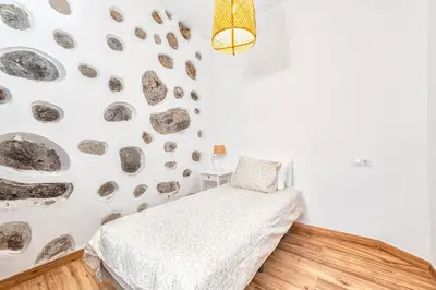 Cama o camas de una habitación en CASA EL ROQUE