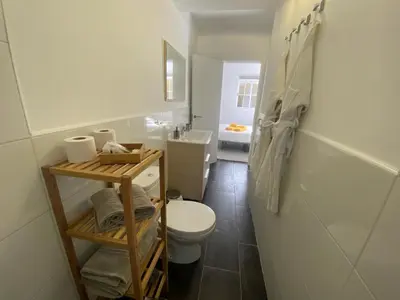 Un baño de SUNNY CARMELITO DELUXE