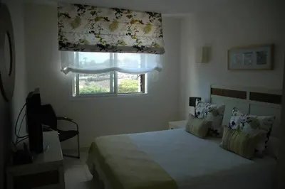 Cama o camas de una habitación en Alojamiento en el Paraiso