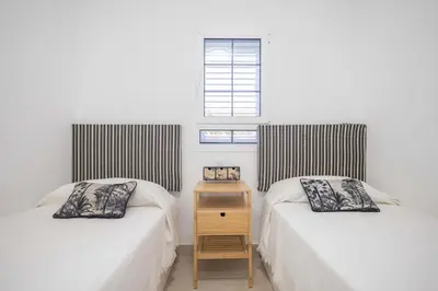 Cama o camas de una habitación en GuestReady - Los Tunos 6
