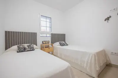 Cama o camas de una habitación en GuestReady - Los Tunos 6