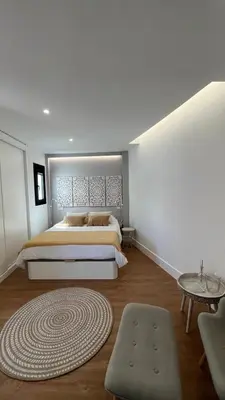Cama o camas de una habitación en C-10 Vegueta Apartment - Private Rooftop Pool