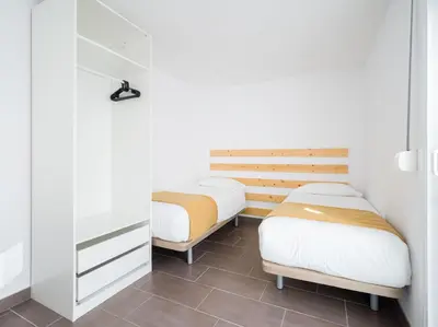 Cama o camas de una habitación en Pasito Blanco Villas