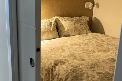 Cama o camas de una habitación en Apartamento al lado de La Playa de Las Canteras