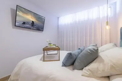 Cama o camas de una habitación en OASIS PLAYA DEL INGLES 324 by Homestaygrancanaria