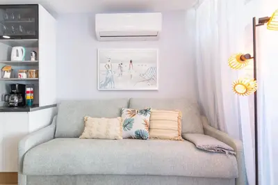 Zona de estar de OASIS PLAYA DEL INGLES 324 by Homestaygrancanaria