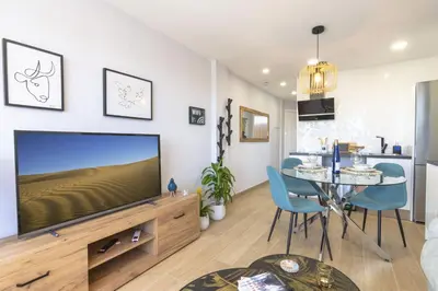 Una televisión o centro de entretenimiento en OASIS PLAYA DEL INGLES 324 by Homestaygrancanaria