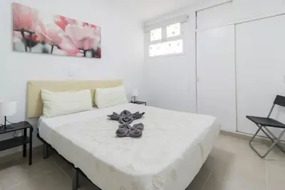 Cama o camas de una habitación en Sunny Vacations Gran Canaria