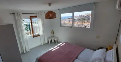 Cama o camas de una habitación en Ocean view sunset terrace - near Anfi del Mar