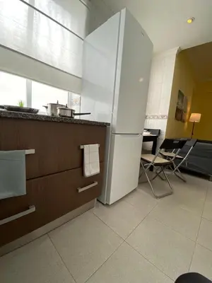 Una cocina o zona de cocina en Luis Morote 2-A Apartamentos