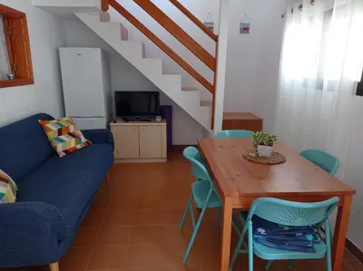 Zona de estar de Casa en la playa, Aldea Coast