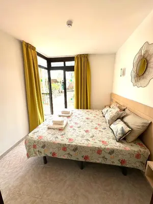 Cama o camas de una habitación en Guinea Apartment