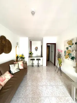 Zona de estar de Guinea Apartment