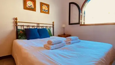 Cama o camas de una habitación en Nice flat with terrace in Puerto Rico