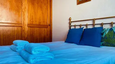 Cama o camas de una habitación en Nice flat with terrace in Puerto Rico