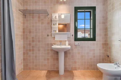 Un baño de Residencial Las Candelarias 36
