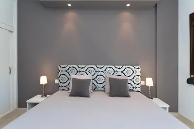 Cama o camas de una habitación en Garden View Apartment Iguazu 3 near Yumbo