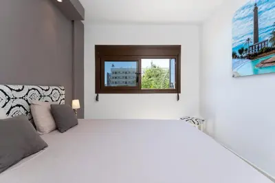 Cama o camas de una habitación en Garden View Apartment Iguazu 3 near Yumbo