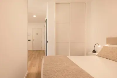 Cama o camas de una habitación en Macaronesia Apartment