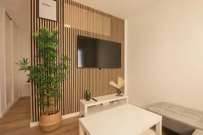Una televisión o centro de entretenimiento en Macaronesia Apartment