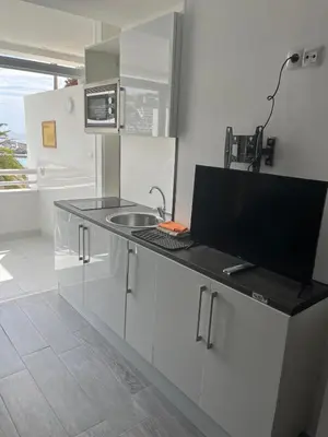 Una cocina o zona de cocina en Tobago215