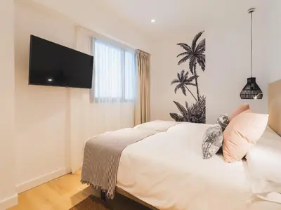 Cama o camas de una habitación en MG CANTERAS SUITES