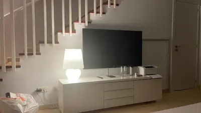 Una televisión o centro de entretenimiento en Villa Feliz 164 Bahia Sunset Beach mit 4 Schlafzimmern