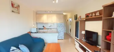 Una cocina o zona de cocina en Acogedor Apartamento ALOE
