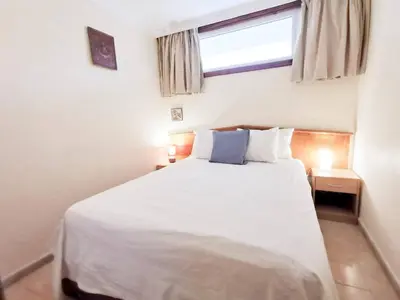 Cama o camas de una habitación en Acogedor Apartamento ALOE