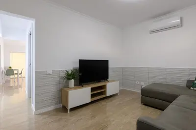 Una televisión o centro de entretenimiento en Beachside hideaway Gran Canaria