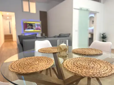 Una televisión o centro de entretenimiento en Apartamento Savaya Suite