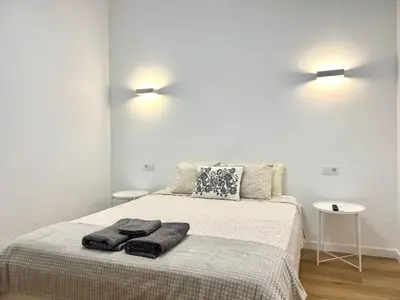 Cama o camas de una habitación en Apartamento Savaya Suite