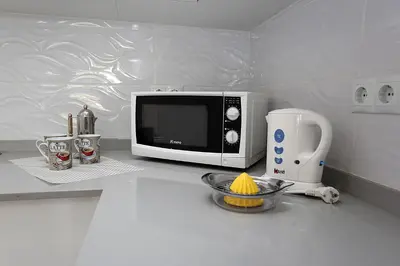 Una cocina o zona de cocina en AGAETE PARQUE: APARTAMENTO VISTA PISCINA
