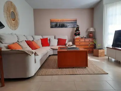 Una televisión o centro de entretenimiento en Casa La Buena Ola