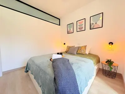 Cama o camas de una habitación en Castle Garden Beach Flat