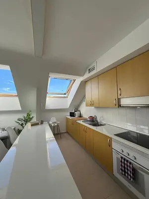 Una cocina o zona de cocina en La Buhardilla