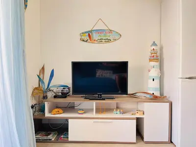Una televisión o centro de entretenimiento en Meloneras Green Oasis Stress Less