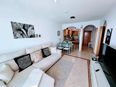 Una televisión o centro de entretenimiento en Residence Ocean View