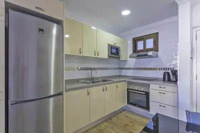 Una cocina o zona de cocina en Atico Puerto Feliz 1 
