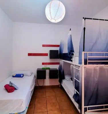 Cama o camas de una habitación en Eden GuestHouse