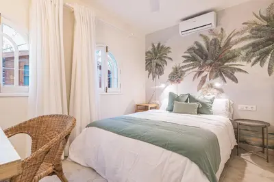 Cama o camas de una habitación en Home2Book Casa del Palmeral Maspalomas, BBQ&Garden